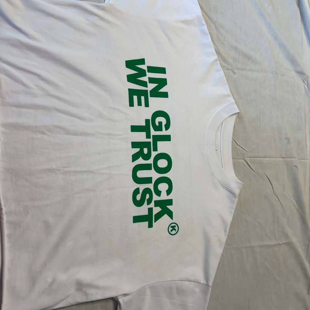 Kikki K White T‑Shirt with Green 'IN GLOCK WE TRUST' Print